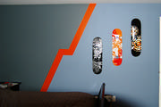 boys room with skateboard theme where orange is that pop of color.
