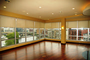 Motorized solar screen roller shades was the perfect choice for this high rise condo.
