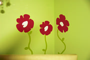 girls bedroom with hand painted pink floral wall decor
