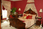 Queen Ann bed with Corona and tailored bedspread in red and cream toile including pillows
