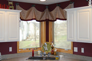 Simple swagged valance over corner kitchen sink mounted on tab post from Helser Brothers. The banding compliments the paint choice.
